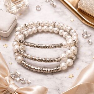 C 1946 Signed White Faux Pearl and Silver Tone Triple Strand Stretch Bracelet